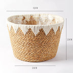 Round woven basket with white zigzag pattern at the top