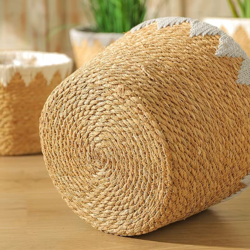 Round woven basket with white zigzag pattern at the top