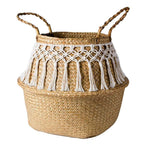 Woven belly basket with white macrame fringe and handles