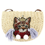 Woven clutch with a cat motif worked into the weave and a zip