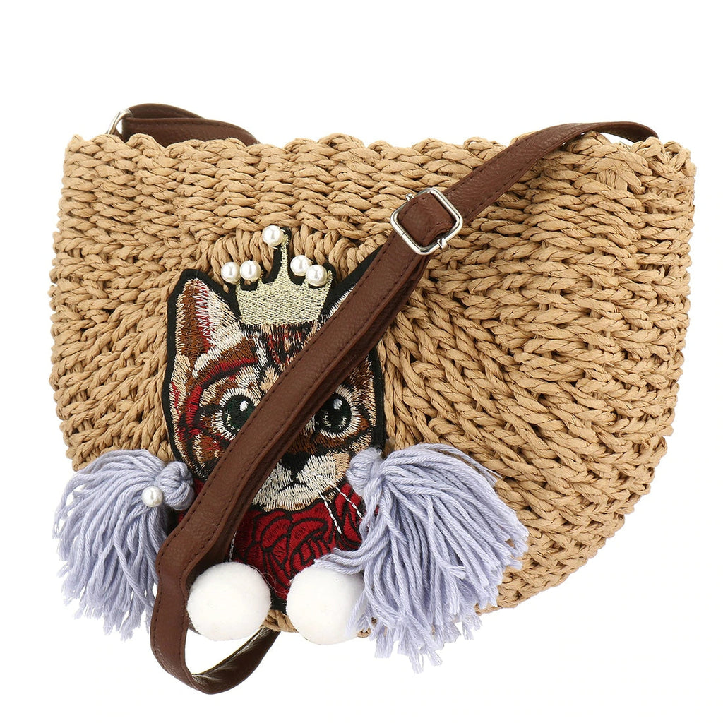 Woven clutch with a cat motif worked into the weave and a zip