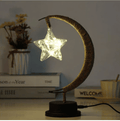 Woven crescent moon shaped USB lamp with a star shaped bulb