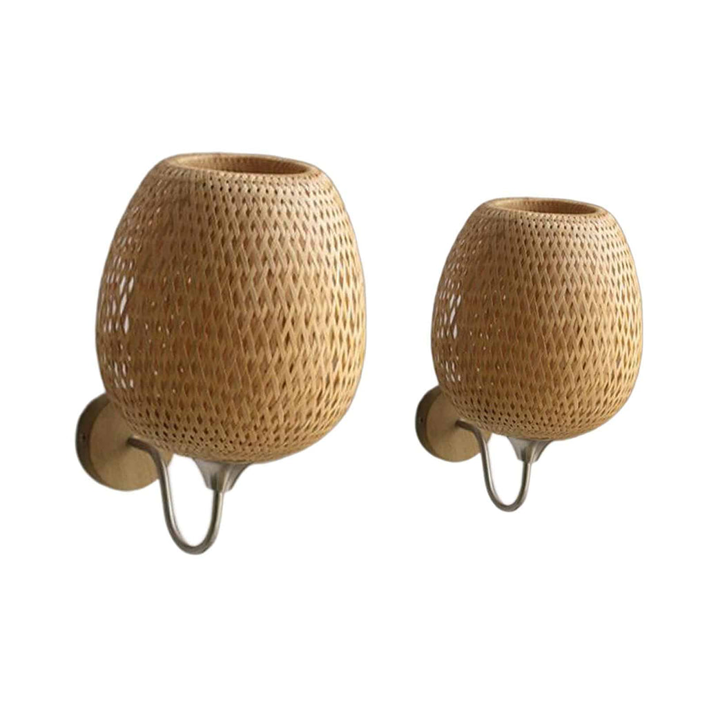 Two woven egg shaped wall sconces on curved arms