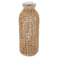 Glass bottle vase wrapped in an open woven wicker net