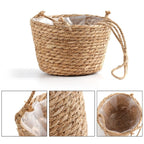 Hanging planter knotted in natural jute rope macrame