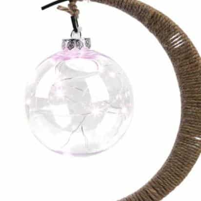 Crescent moon lamp with a hand woven hemp frame and a round blush pink globe