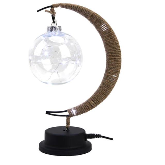 Crescent moon lamp with a hand woven hemp frame and a round silver bulb