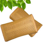 Brown hand woven PE rattan neck cushion with a curved shape
