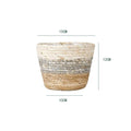 Woven plant pot covers with liners holding green plants