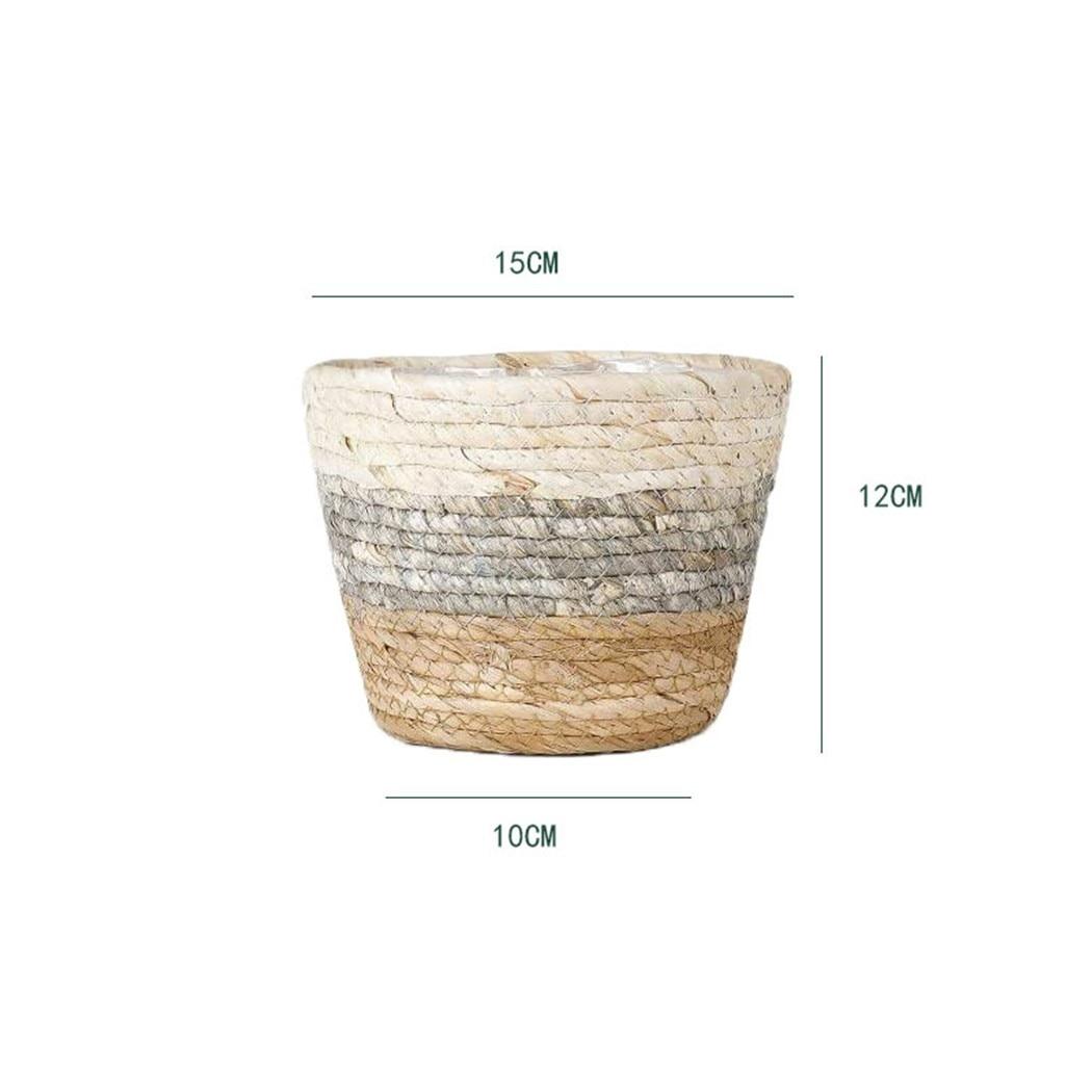 Woven plant pot covers with liners holding green plants