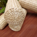 Cylindrical bolster cushion tightly hand woven in light rattan