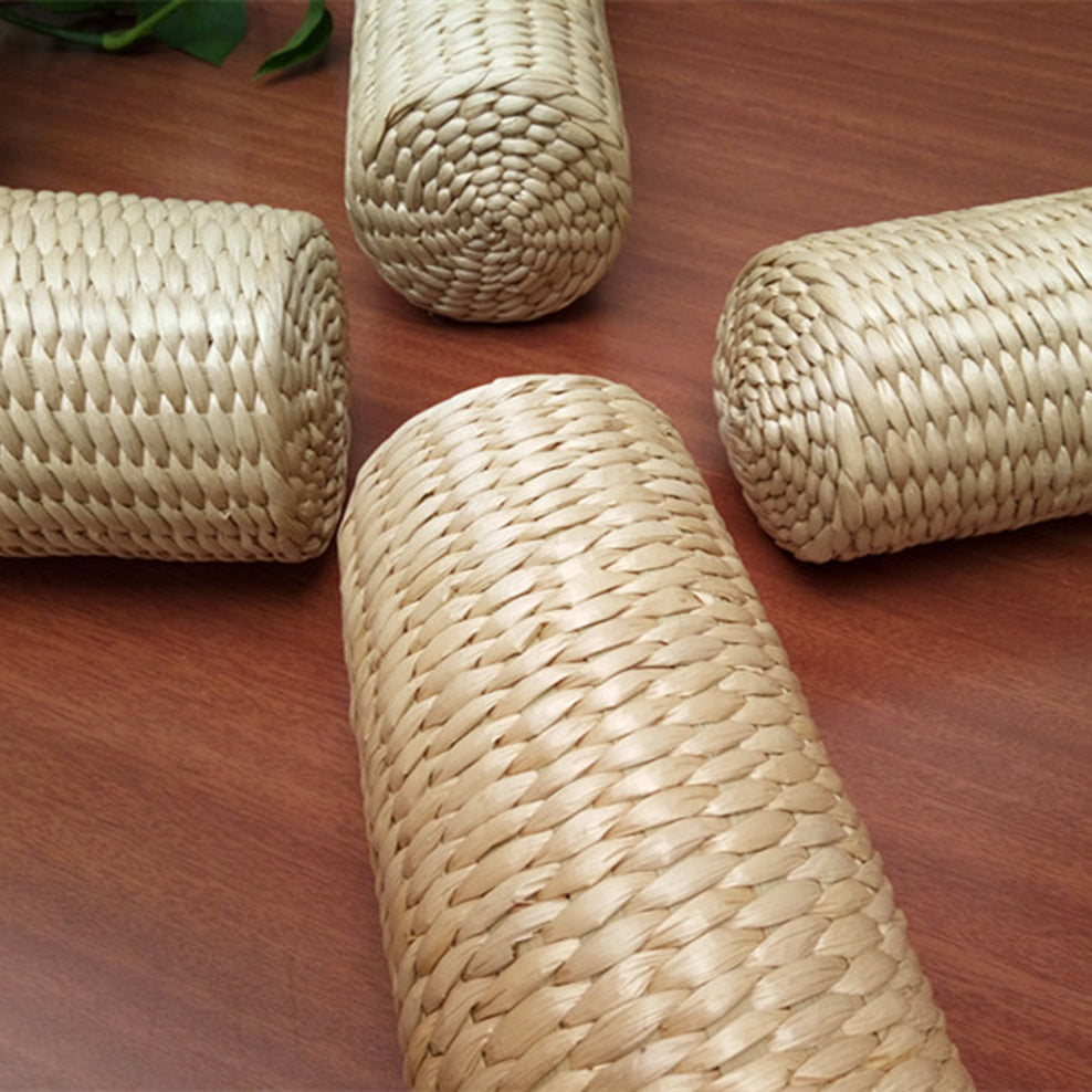 Cylindrical bolster cushion tightly hand woven in light rattan