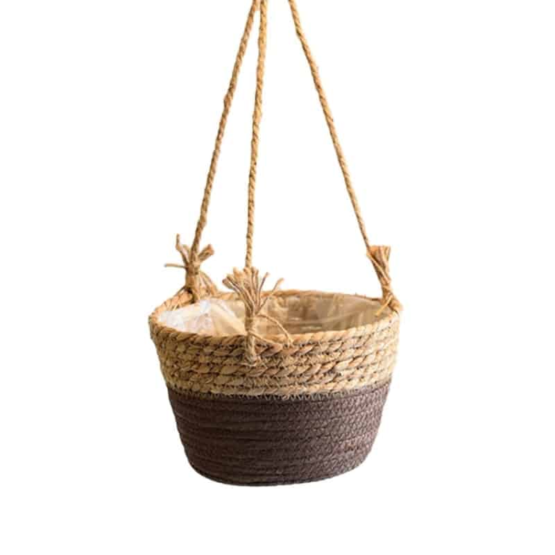 Hand woven rattan hanging planter for a balcony or pergola