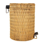 Woven rattan trash can with a foot pedal and a lid