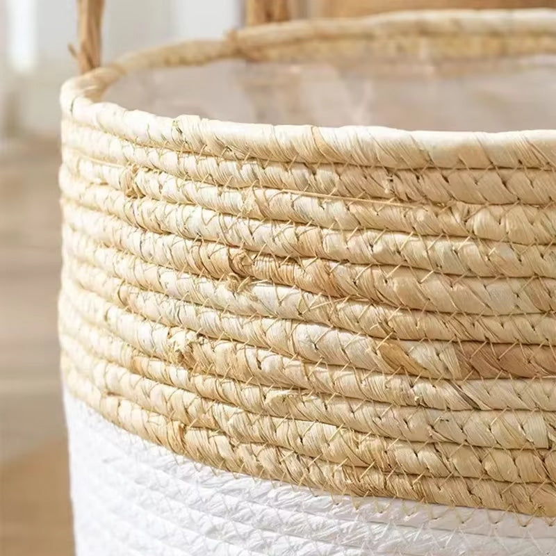 Round hand woven rattan planter with a white painted band