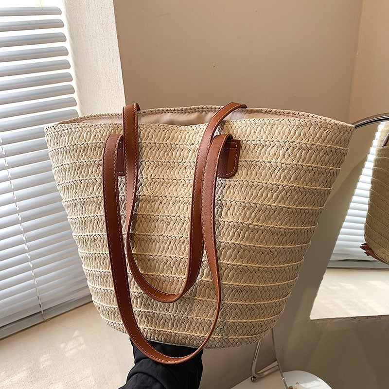 Structured woven straw bag with wide shoulder handles in beige or brown