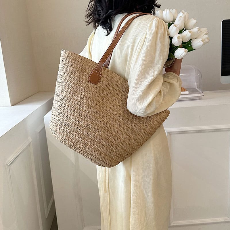 Structured woven straw bag with wide shoulder handles in beige or brown