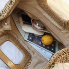 Woven straw tote bag with varnished wooden handles in beige or brown