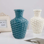 Blue vase with a raised woven texture