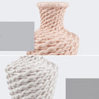 Blue vase with a raised woven texture
