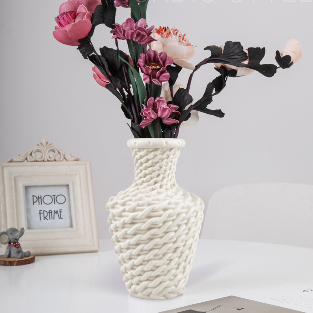 Blue vase with a raised woven texture