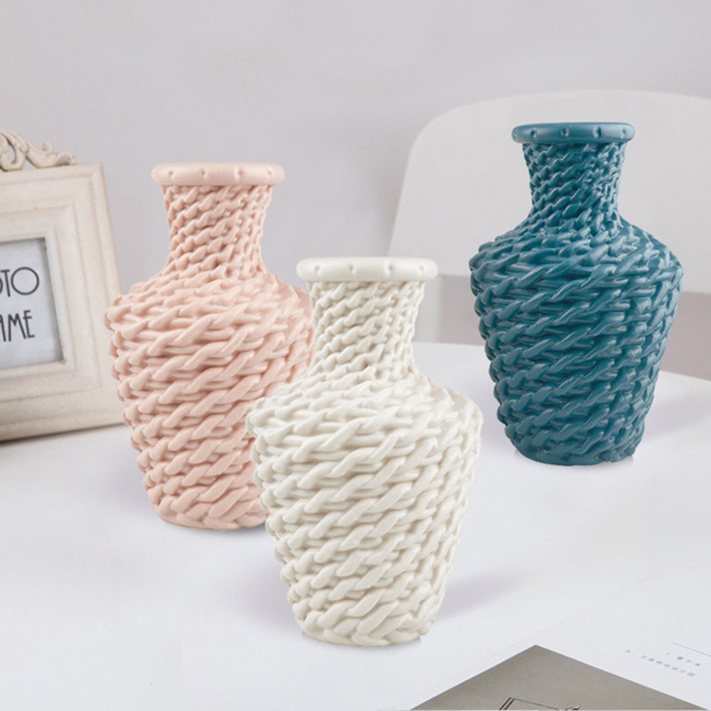 Blue vase with a raised woven texture