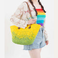 Large two tone yellow and green woven straw tote bag