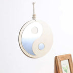 Yin yang shaped wooden hanging mirror